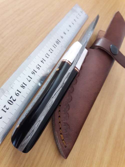 Handmade DAMASCUS Steel Hunting Knife, FULL TANG, Bull horn and Camel Bone handle scales.