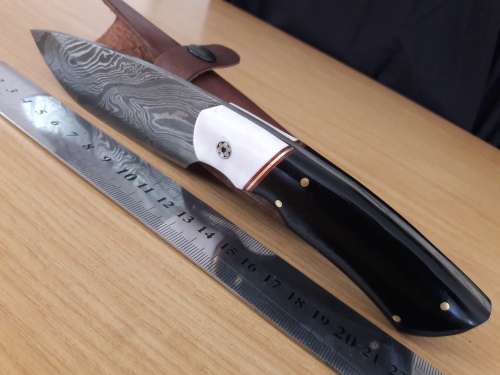 Handmade DAMASCUS Steel Hunting Knife, FULL TANG, Bull horn and Camel Bone handle scales.