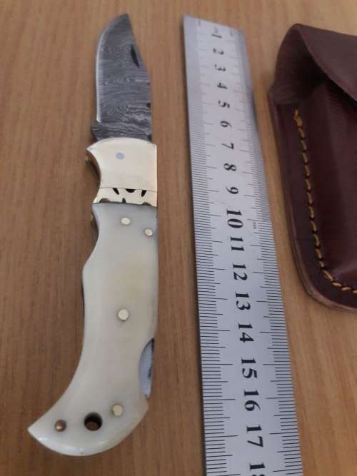 Handmade Damascus steel folding knife with CAMEL BONE handle scales.