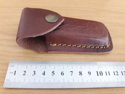 Handmade Damascus steel folding knife with CAMEL BONE handle scales.