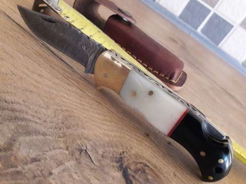 Handmade Damascus steel folding knife with CAMEL BONE & Bull HORN handle scales.