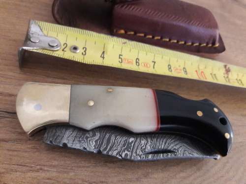 Handmade Damascus steel folding knife with CAMEL BONE & Bull HORN handle scales.