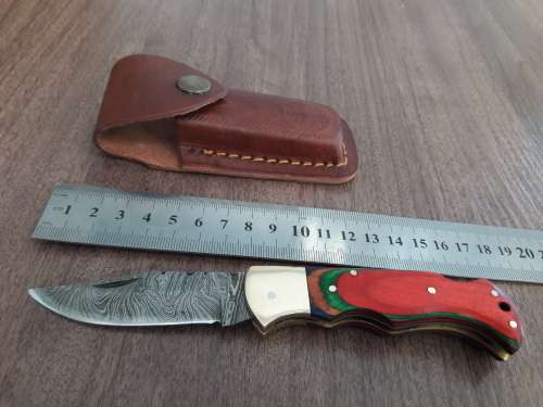 Handmade Damascus steel folding knife with WOODEN handle scales.