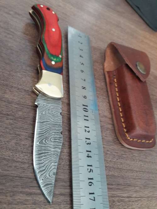 Handmade Damascus steel folding knife with WOODEN handle scales.