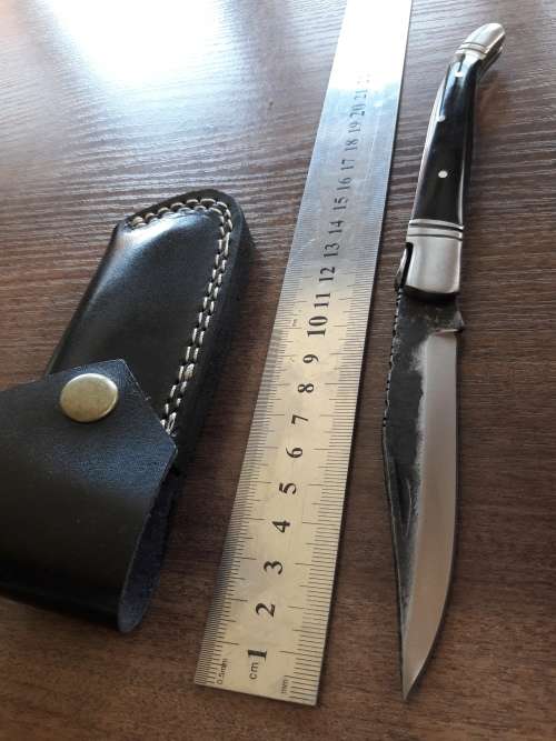 HANDMADE Black Ops, 1095 HIGH Carbon High quality steel folding knife with Bull Horn handle scales.