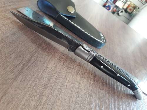 HANDMADE Black Ops, 1095 HIGH Carbon High quality steel folding knife with Bull Horn handle scales.