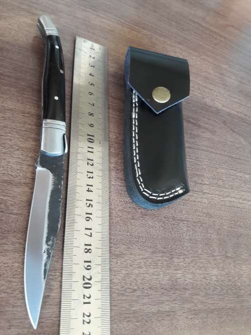 HANDMADE Black Ops, 1095 HIGH Carbon High quality steel folding knife with Bull Horn handle scales.