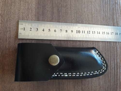 HANDMADE Black Ops, 1095 HIGH Carbon High quality steel folding knife with Bull Horn handle scales.