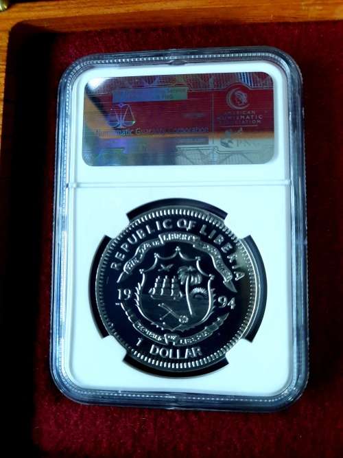 1994 LIBERIA $1 Mandela Presidential Inauguration Coin, NGC Graded MS67.