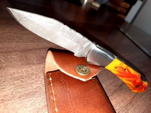 Handmade Damascus steel folding knife with Epoxy Resin handle scales. Crazy R1 start, no reserve.