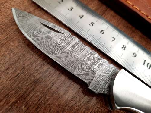 Handmade Damascus steel folding knife with Bull Horn Handle. NEW STOCK !!