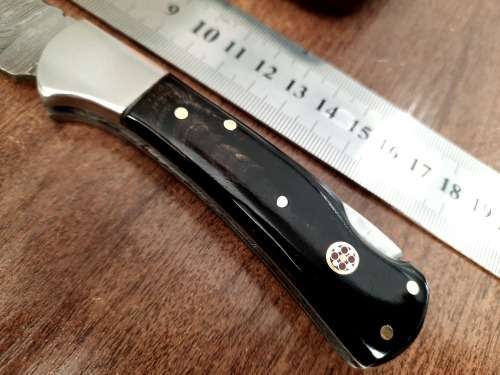 Handmade Damascus steel folding knife with Bull Horn Handle. NEW STOCK !!
