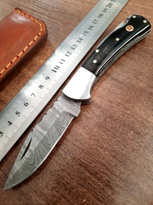 Handmade Damascus steel folding knife with Bull Horn Handle. NEW STOCK !!