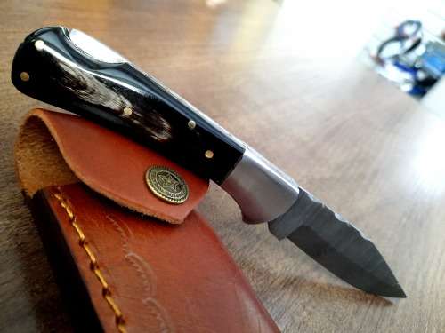 Handmade Damascus steel folding knife with Bull Horn Handle. NEW STOCK !!