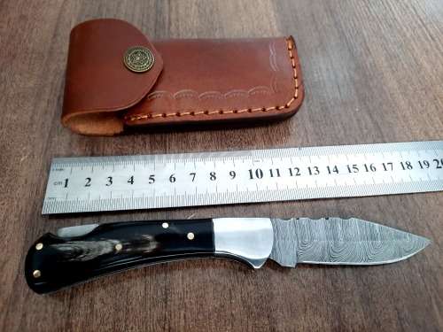 Handmade Damascus steel folding knife with Bull Horn Handle. NEW STOCK !!