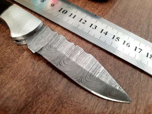 Handmade Damascus steel folding knife with Bull Horn Handle. NEW STOCK !!