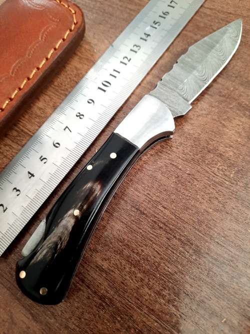 Handmade Damascus steel folding knife with Bull Horn Handle. NEW STOCK !!