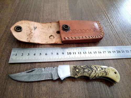 Handmade Damascus steel folding knife w Camel Bone Handle Scales. Leather pouch is FREE.