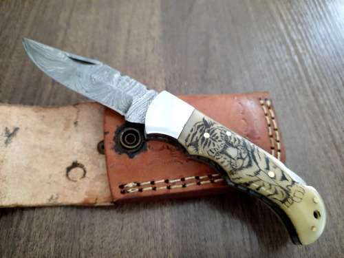 Handmade Damascus steel folding knife w Camel Bone Handle Scales. Leather pouch is FREE.