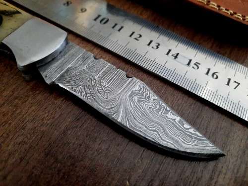 Handmade Damascus steel folding knife w Camel Bone Handle Scales. Leather pouch is FREE.