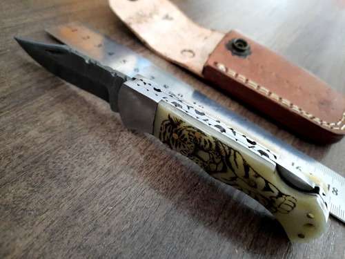 Handmade Damascus steel folding knife w Camel Bone Handle Scales. Leather pouch is FREE.