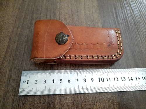 Handmade Damascus steel folding knife w Camel Bone Handle Scales. Leather pouch is FREE.