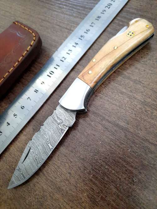 Handmade Damascus steel folding knife w Olive Wood Handle Scales. New stock !!