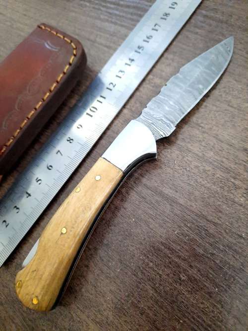 Handmade Damascus steel folding knife w Olive Wood Handle Scales. New stock !!