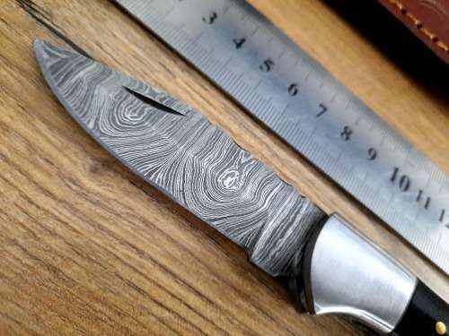 Handmade Damascus steel folding knife w  Bull Horn Handle Scales. New stock !!