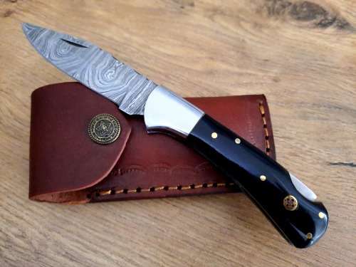 Handmade Damascus steel folding knife w  Bull Horn Handle Scales. New stock !!