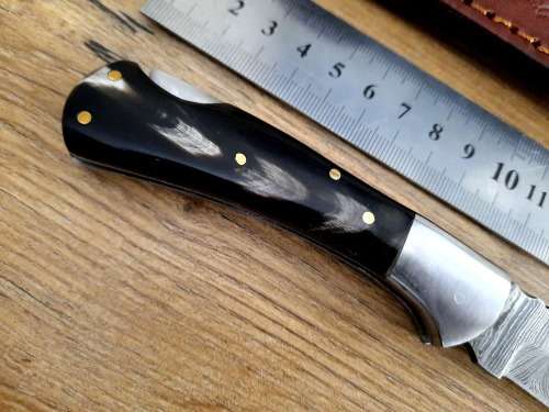 Handmade Damascus steel folding knife w  Bull Horn Handle Scales. New stock !!