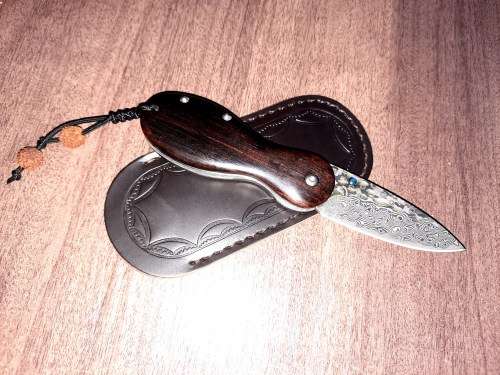 Damascus VG-10 Stainless Steel folding knife, RAZOR Sharp, New Stock, High Quality, Ebony handle.