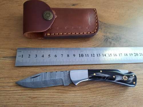 Handmade Damascus steel folding knife w  Bull Horn Handle Scales. New stock !!