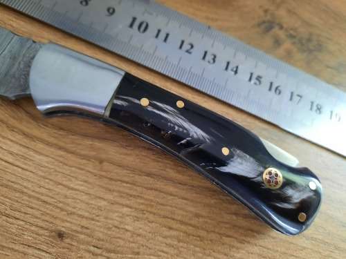 Handmade Damascus steel folding knife w  Bull Horn Handle Scales. New stock !!