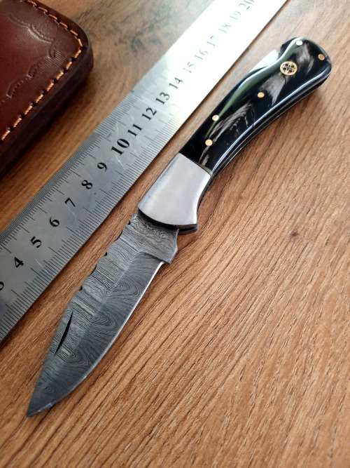 Handmade Damascus steel folding knife w  Bull Horn Handle Scales. New stock !!