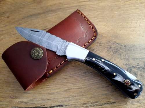 Handmade Damascus steel folding knife w  Bull Horn Handle Scales. New stock !!
