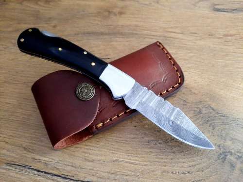 Handmade Damascus steel folding knife w  Bull Horn Handle Scales. New stock !!