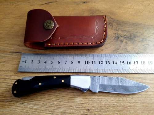Handmade Damascus steel folding knife w  Bull Horn Handle Scales. New stock !!