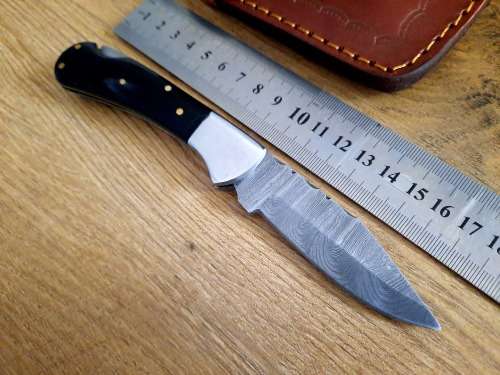 Handmade Damascus steel folding knife w  Bull Horn Handle Scales. New stock !!