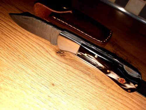 Handmade Damascus steel folding knife w  Bull Horn Handle Scales. New stock !!