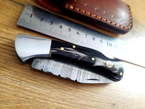 Handmade Damascus steel folding knife w  Bull Horn Handle Scales. New stock !!