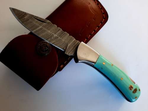 Handmade Damascus steel folding knife w Epoxy Resin Handle Scales. New stock !!