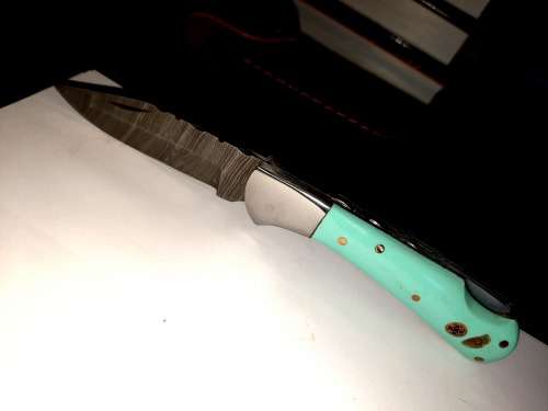 Handmade Damascus steel folding knife w Epoxy Resin Handle Scales. New stock !!