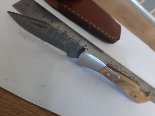 Handmade Damascus steel folding knife w Wooden Handle Scales. New stock !!