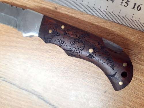 Handmade Damascus steel folding knife w Wooden Handle Scales. Pouch in bad shape, see pictures.