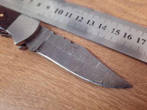 Handmade Damascus steel folding knife w Wooden Handle Scales. Pouch in bad shape, see pictures.