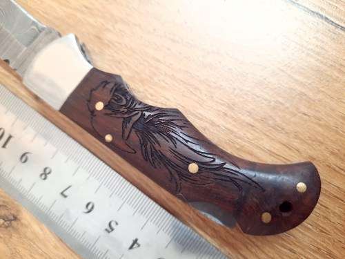 Handmade Damascus steel folding knife w Wooden Handle Scales. Pouch in bad shape, see pictures.