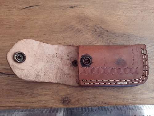 Handmade Damascus steel folding knife w Wooden Handle Scales. Pouch in bad shape, see pictures.