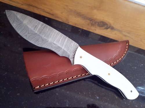 Handmade Damascus steel HUNTING  knife with Epoxy Resin handle scales.