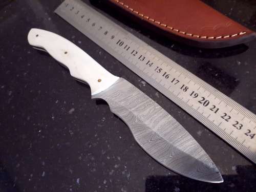 Handmade Damascus steel HUNTING  knife with Epoxy Resin handle scales.